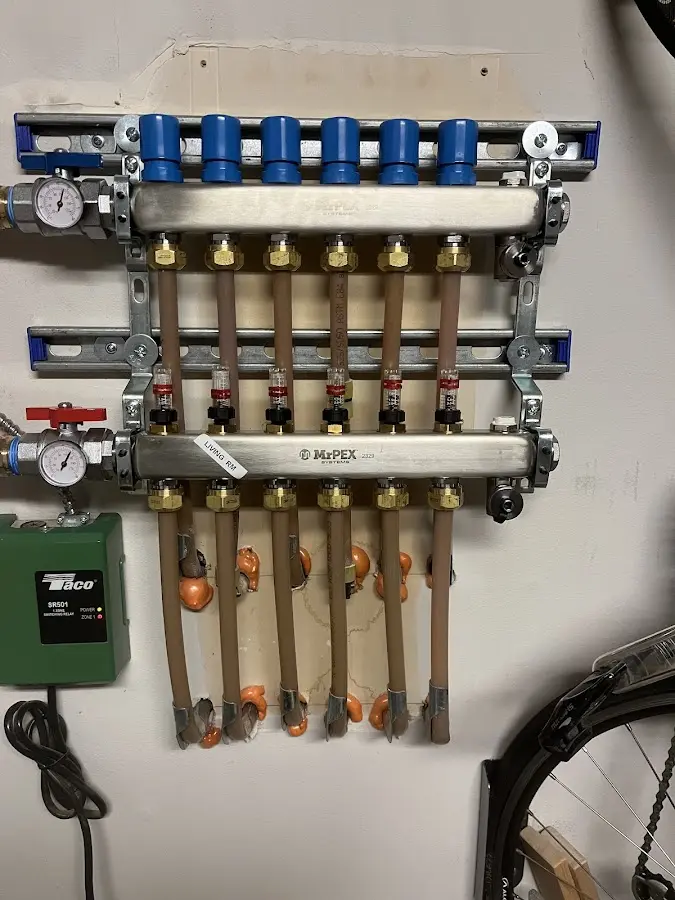 Plumber performing Gas Line Installation at a residential property in Brown